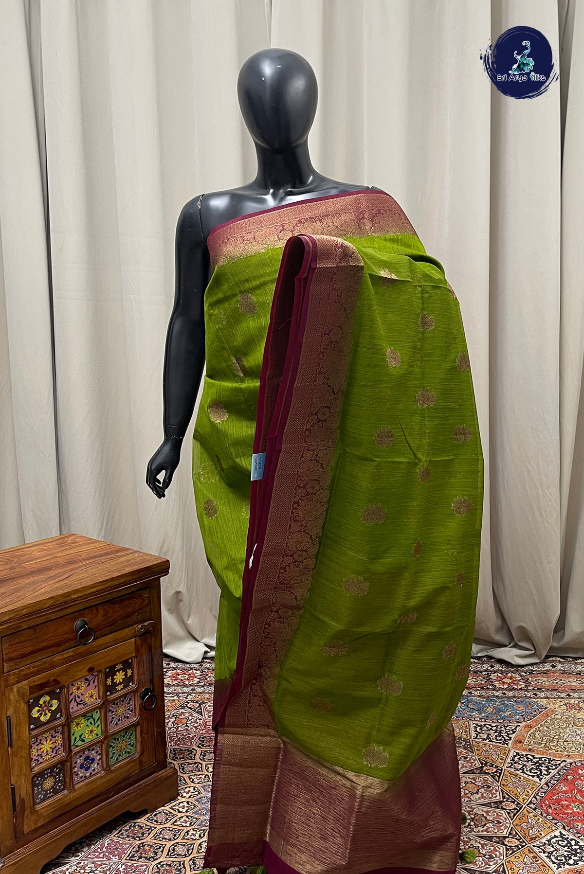 Mehendi Green Raw Silk Saree With Zari Buttas Pattern