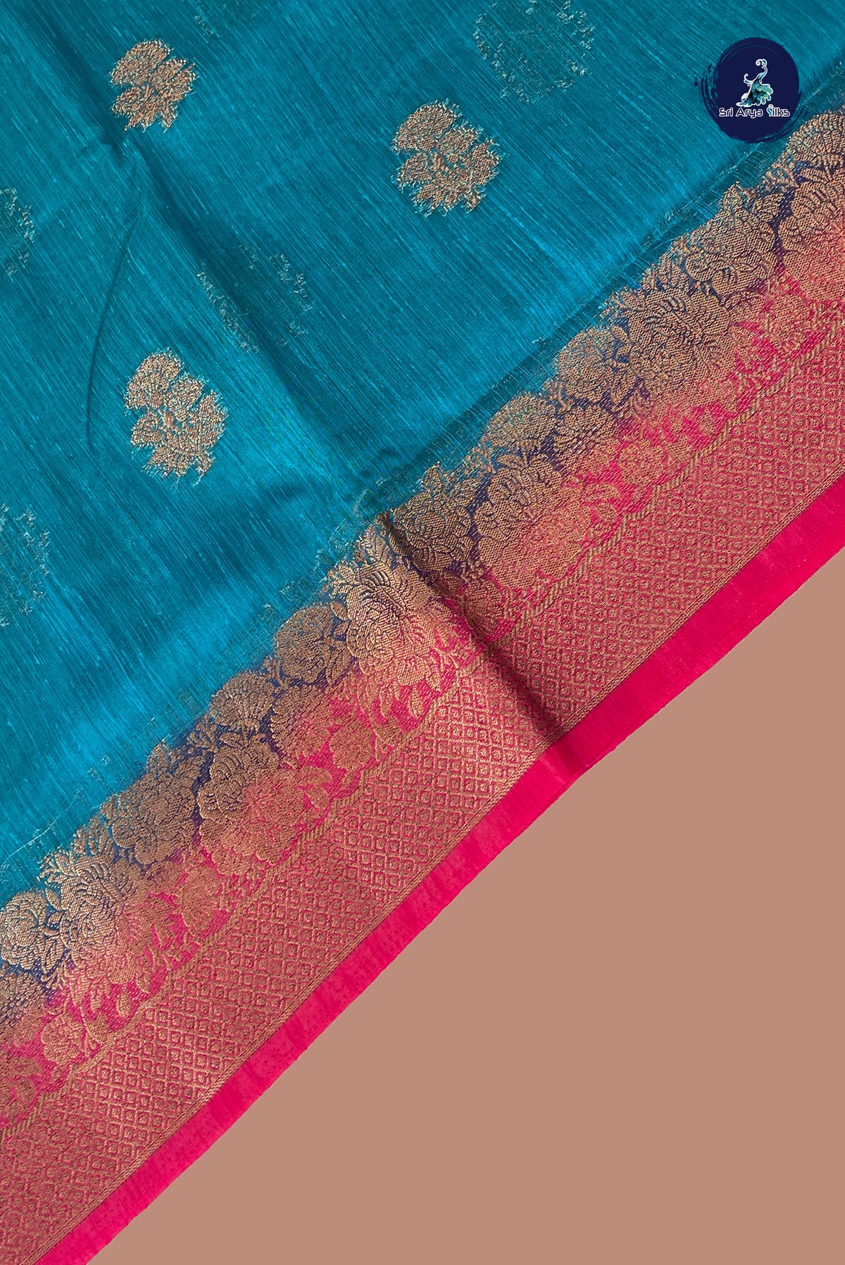 Teal Blue Raw Silk Saree With Zari Buttas Pattern