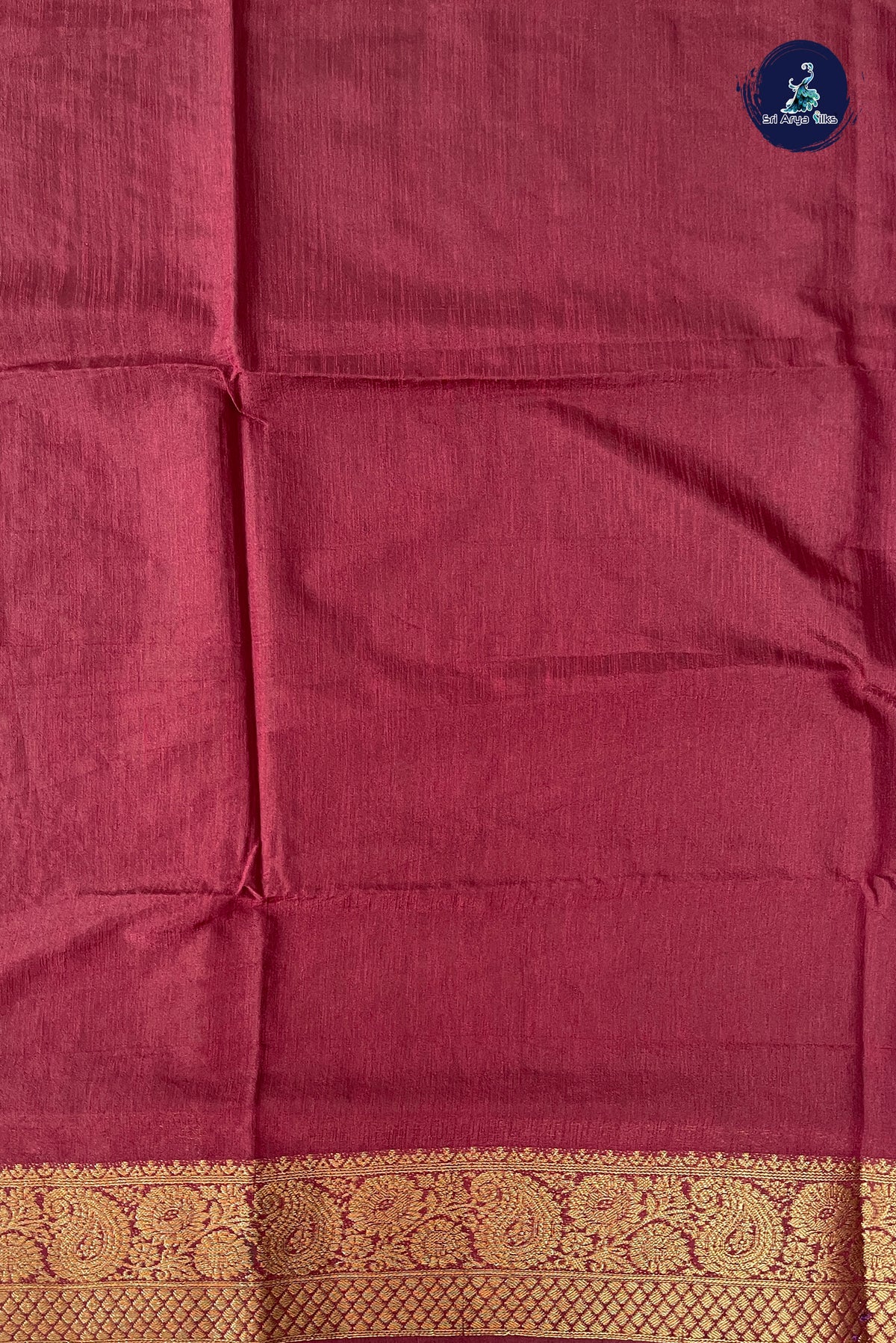 Bottle Green Raw Silk Saree With Plain Pattern