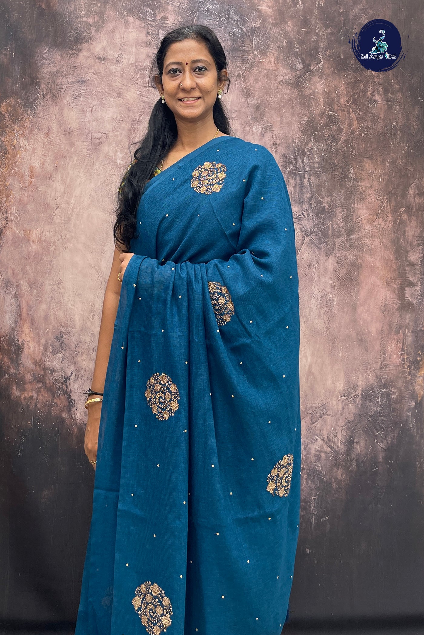 Teal Blue Jute Saree With Embroidery Pattern