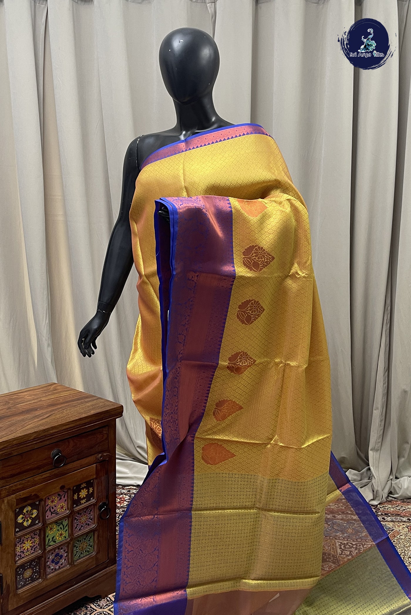 Yellow Semi Raw Silk  Saree With Embossed Pattern