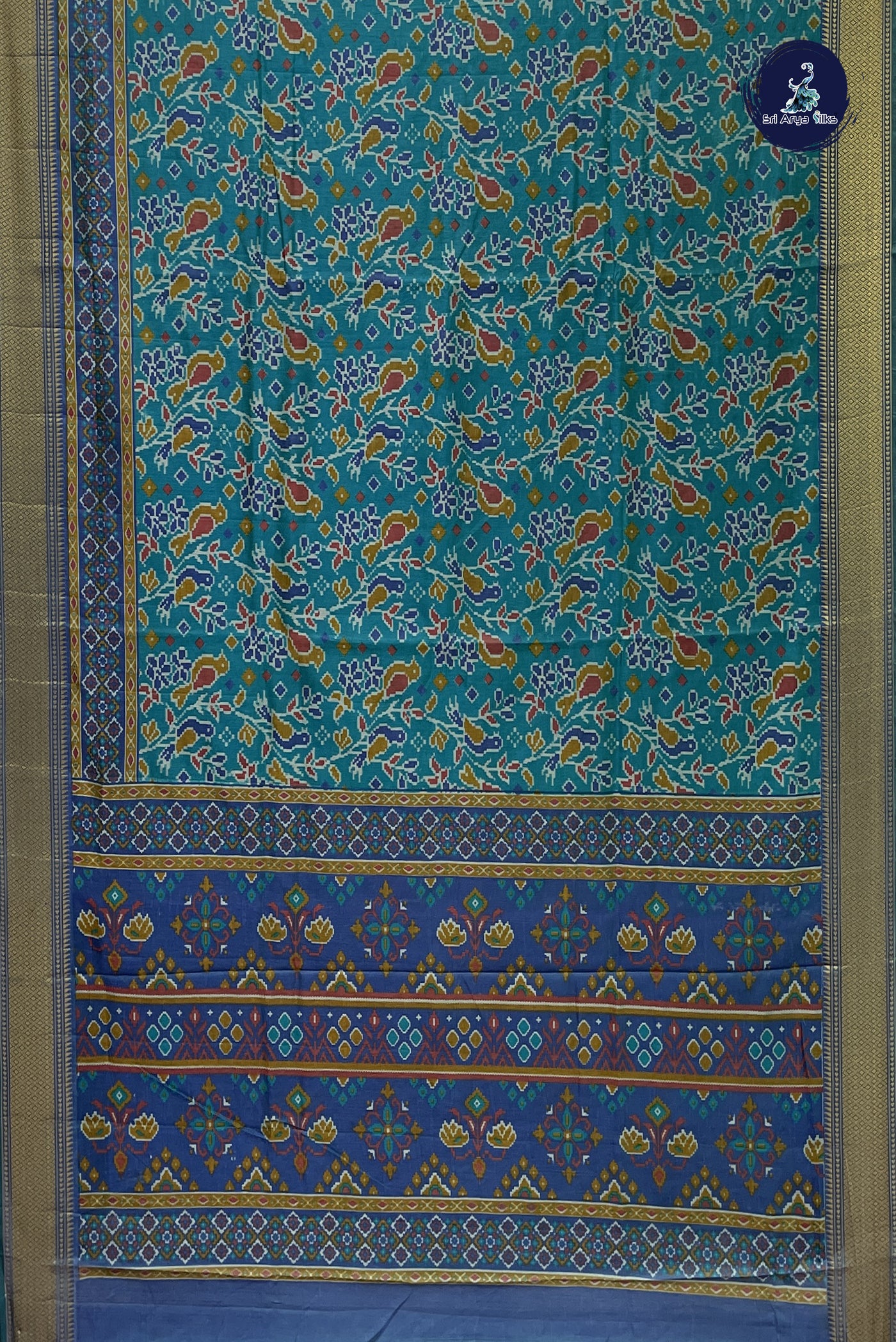 Turquoise Semi Pattola Saree With Patola Pattern