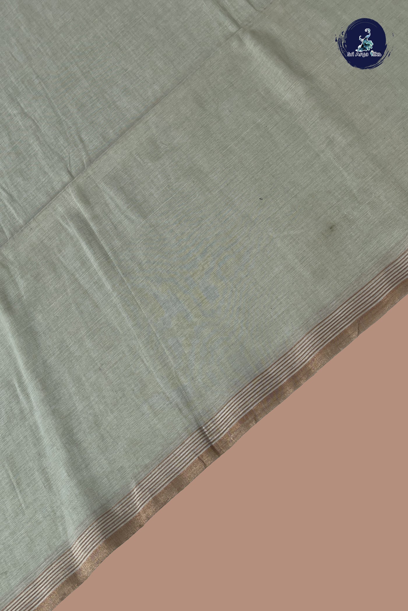 Pastel Green Linen Saree With Plain Pattern