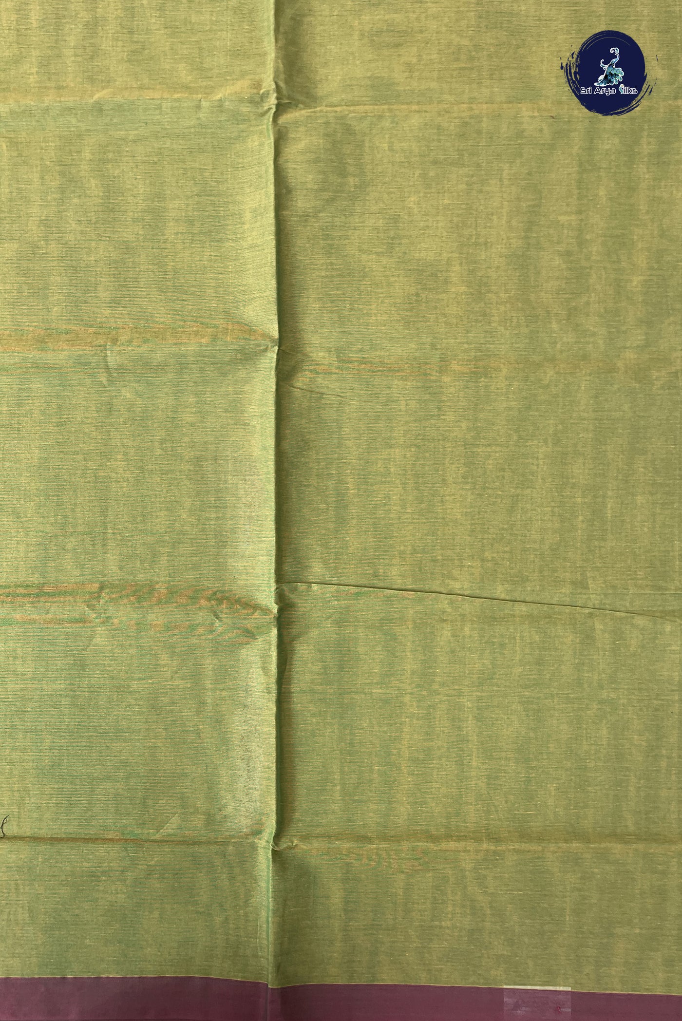 Green Cotton Saree With Embossed Pattern