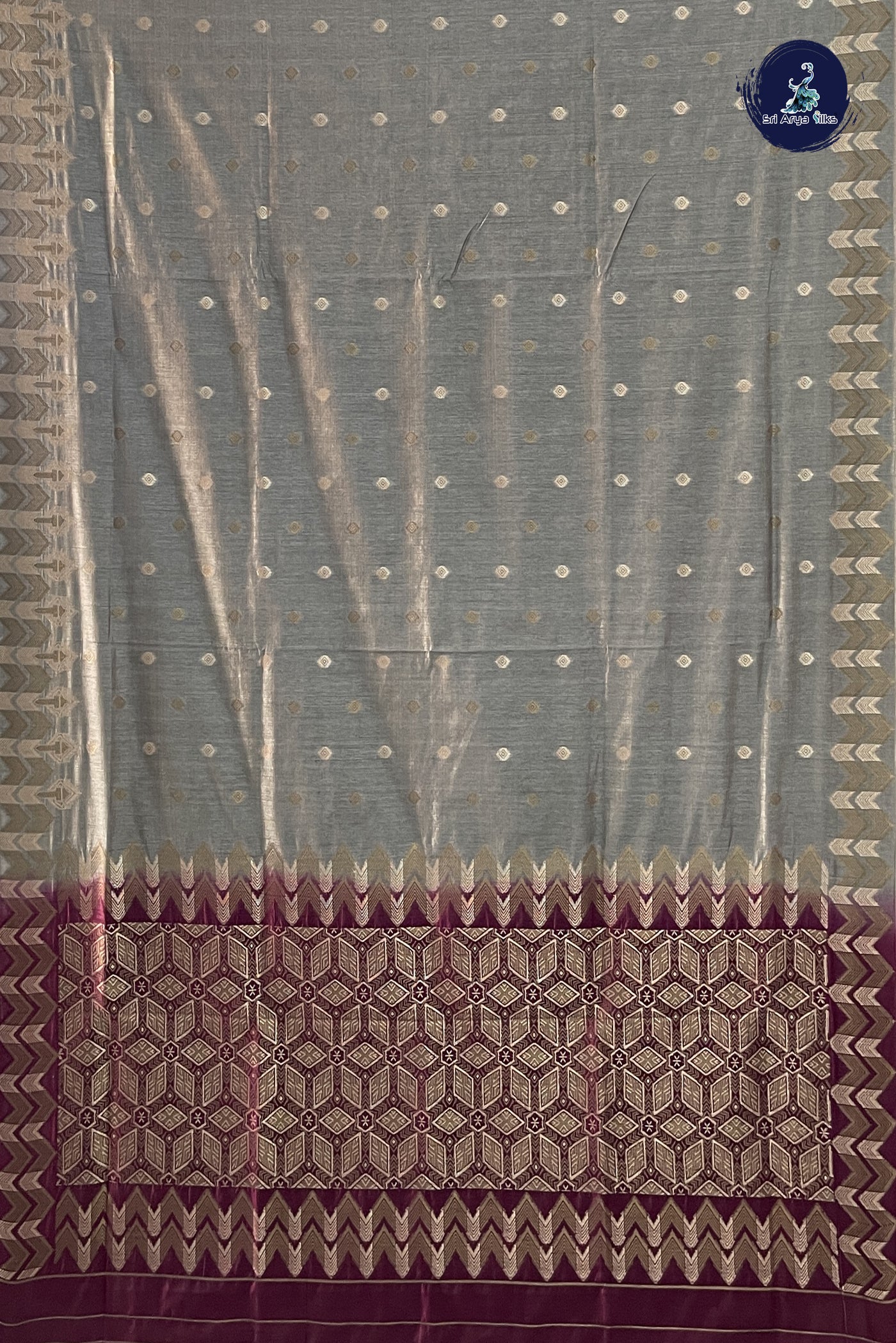 Grey Raw Silk Saree With Zari Buttas Pattern