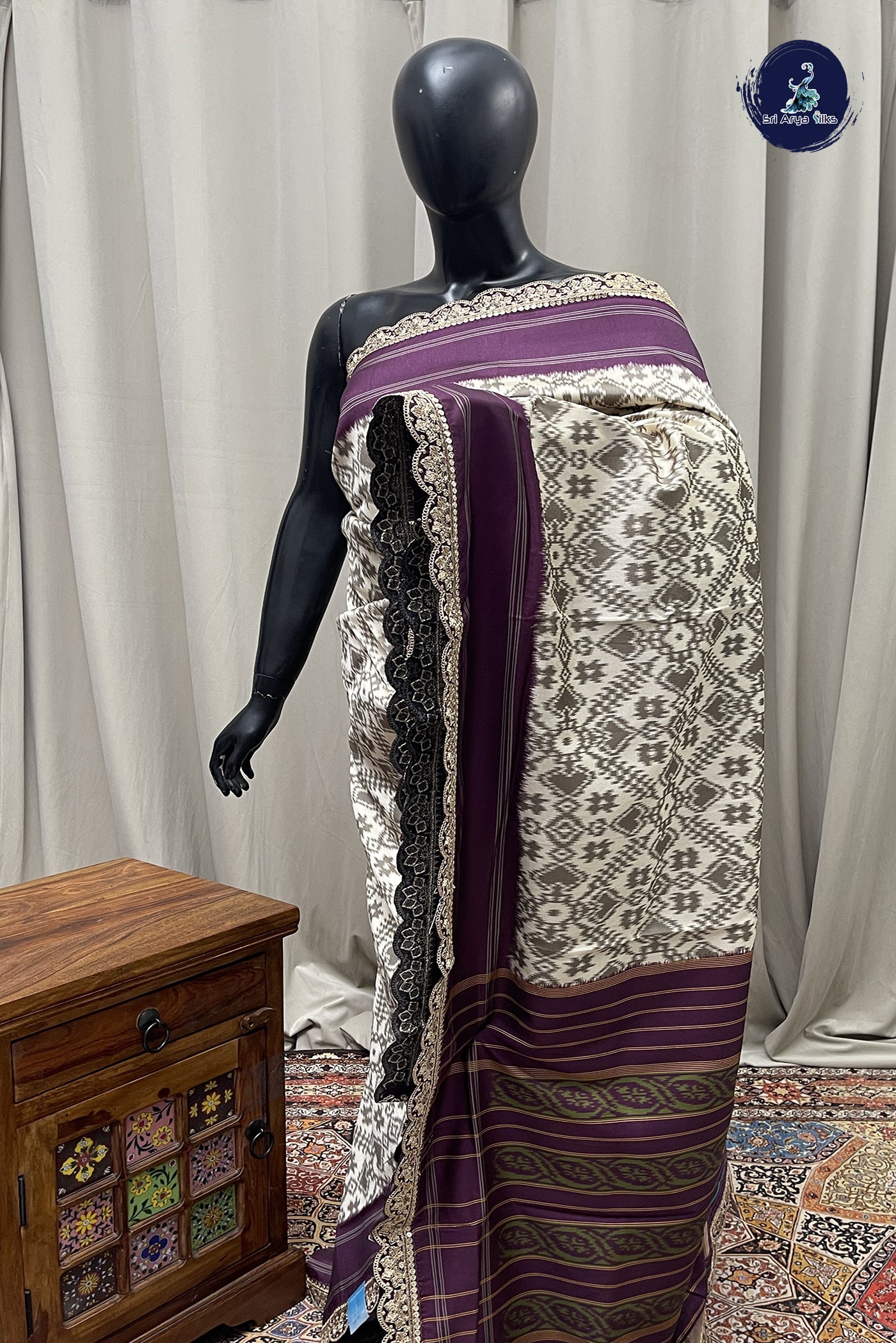 Off White Raw Silk saree With Ikat Pattern