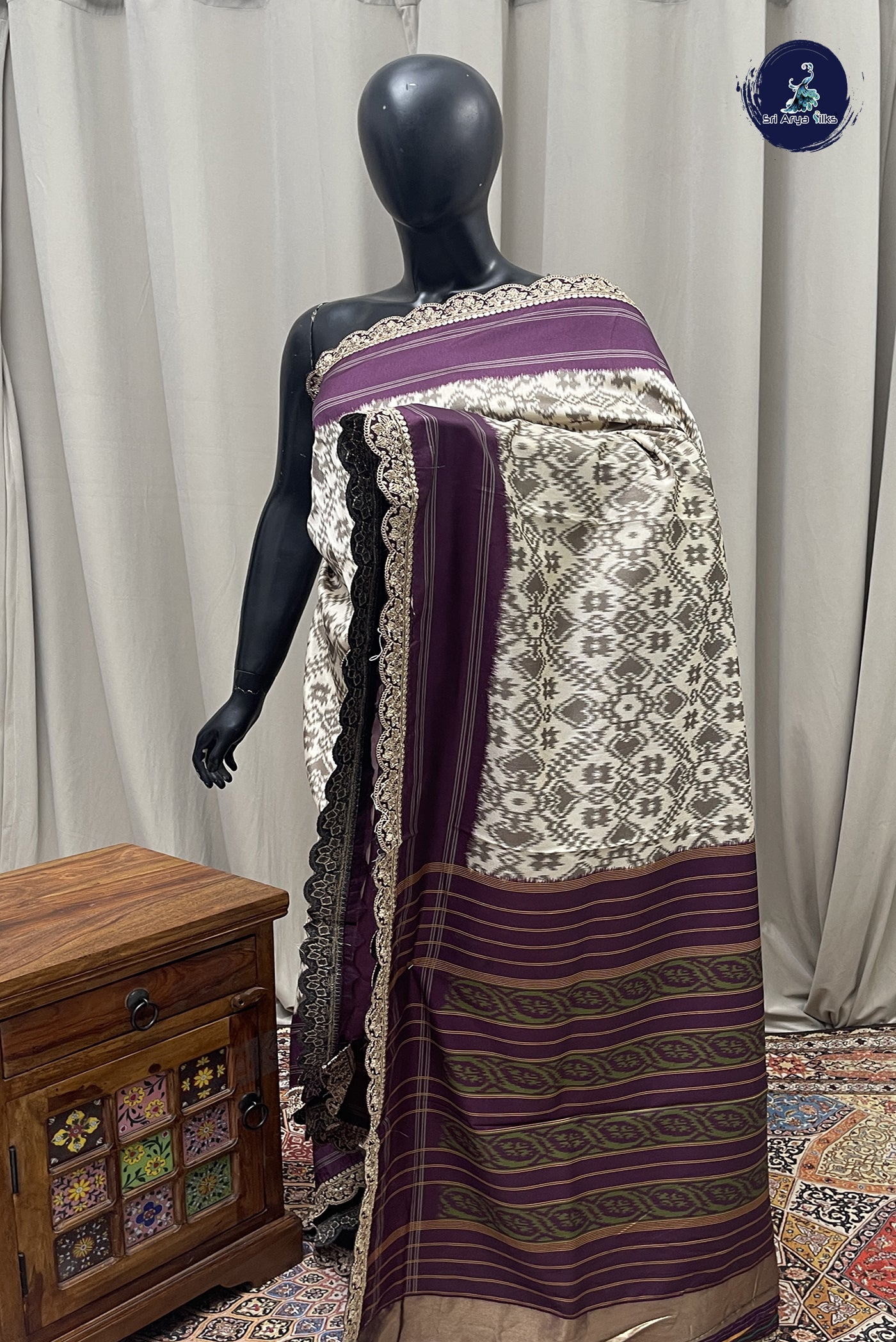 Off White Raw Silk saree With Ikat Pattern