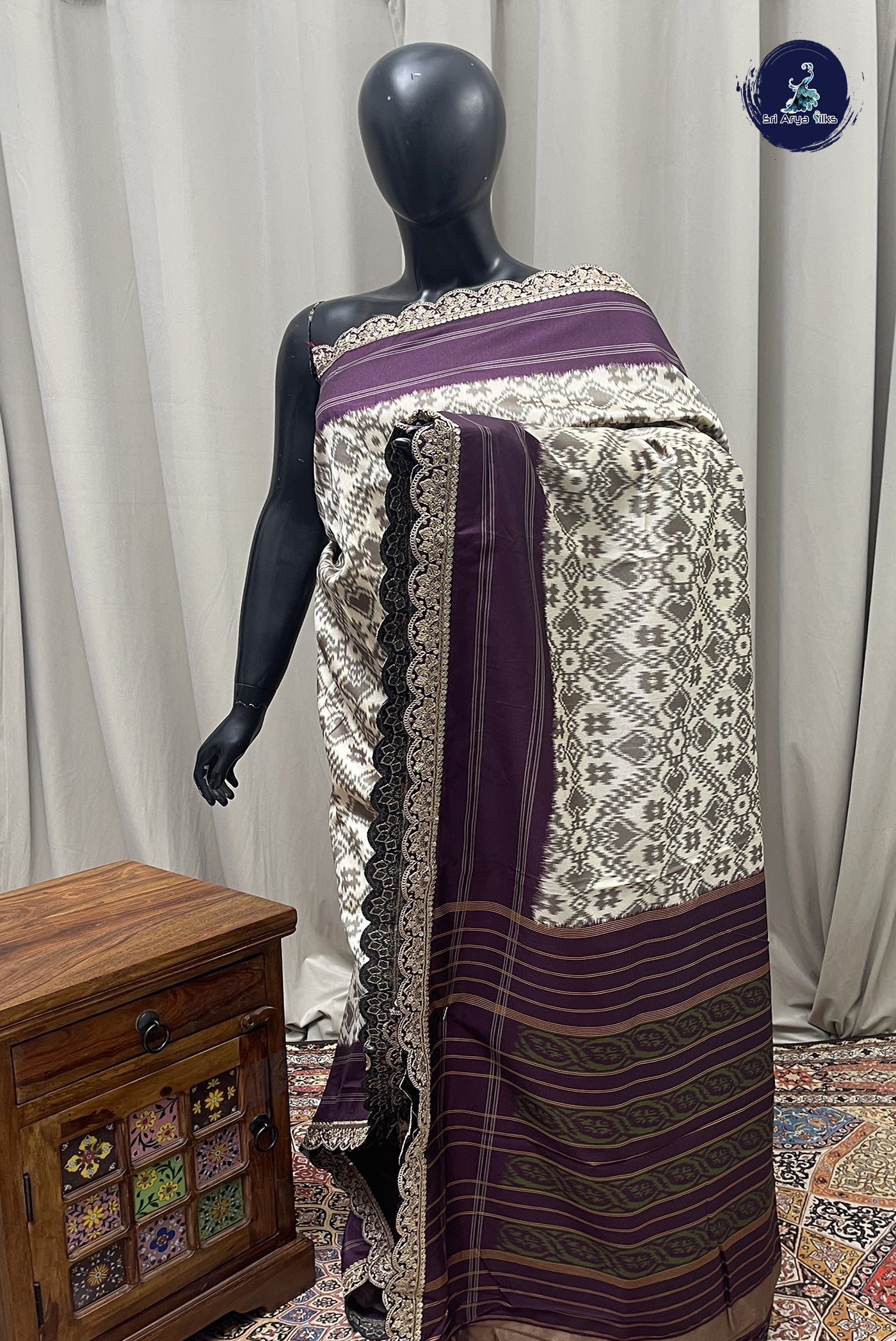Off White Raw Silk saree With Ikat  Pattern