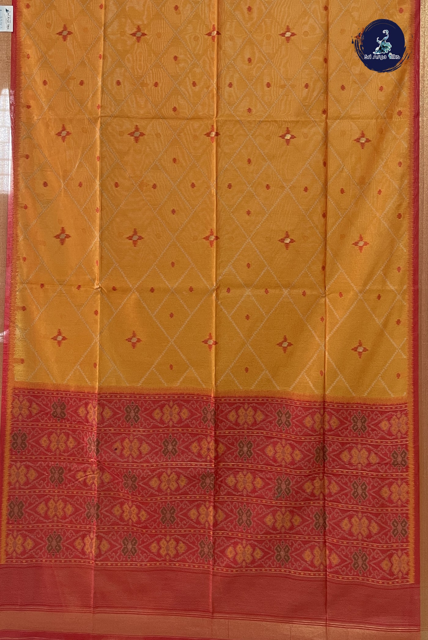 Orange Raw Silk Saree With Patola Pattern