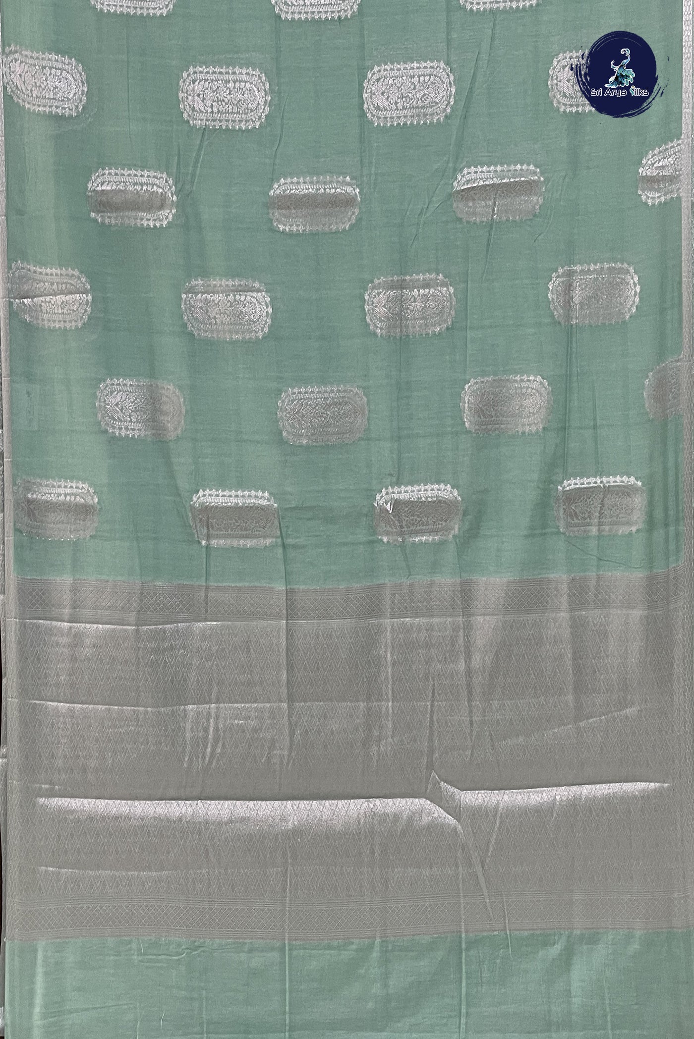 Pastel Green Raw Silk Saree With Zari Buttas Pattern