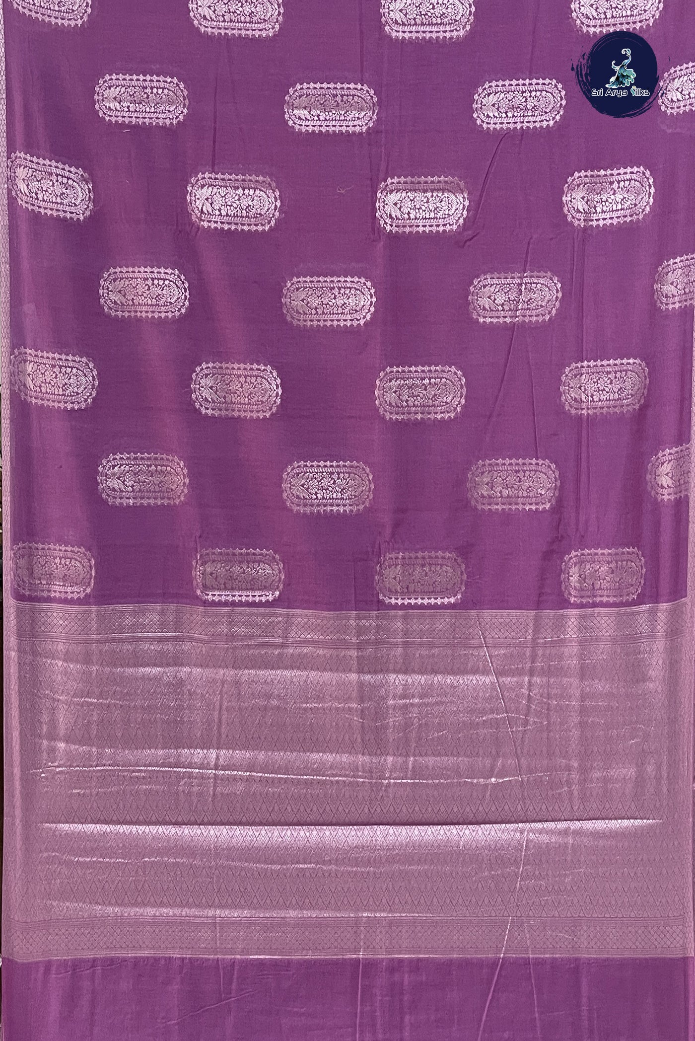 Lavender Raw Silk Saree With Zari Buttas Pattern