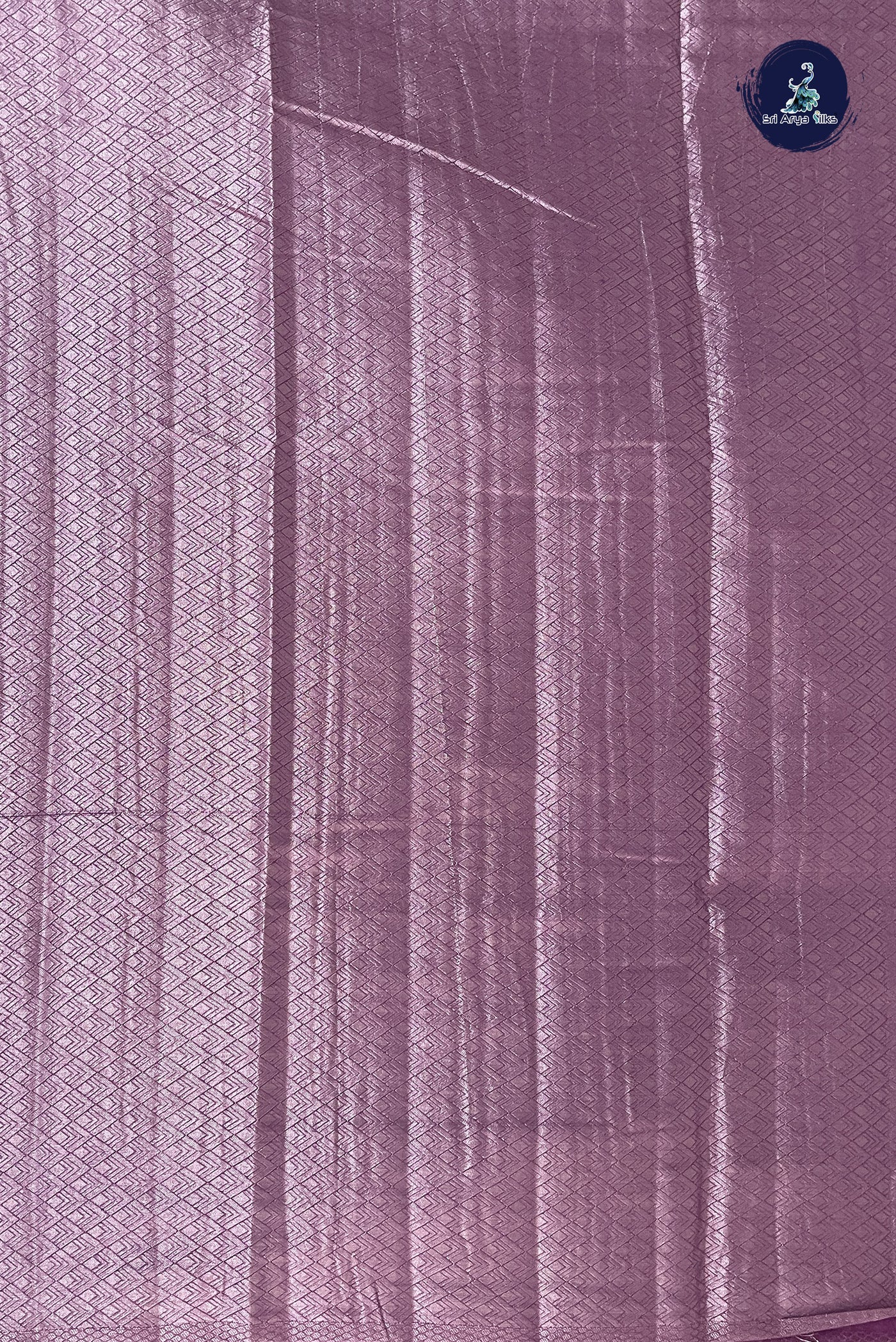 Lavender Raw Silk Saree With Zari Buttas Pattern