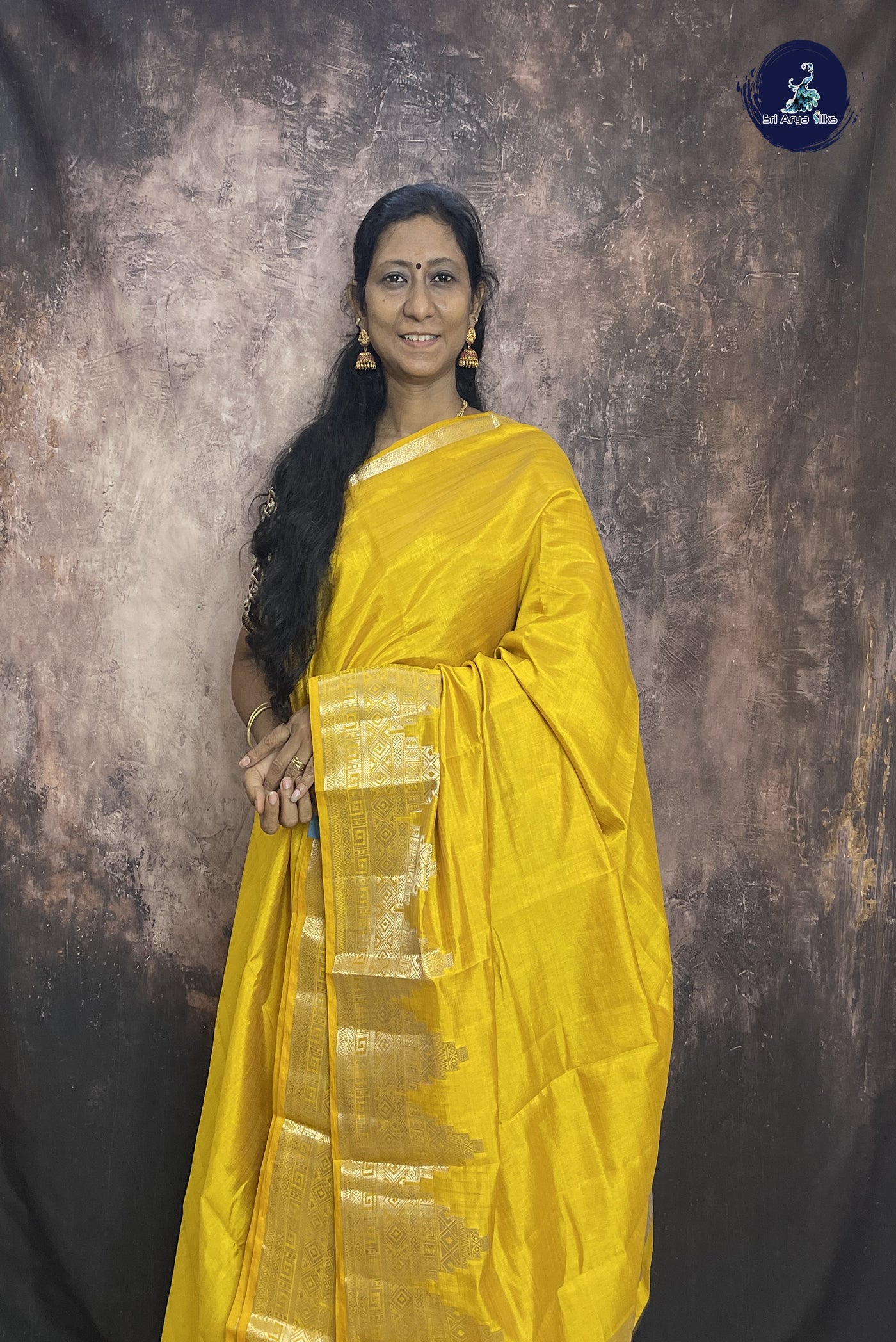 Yellow Semi Tussar Saree With Plain Pattern