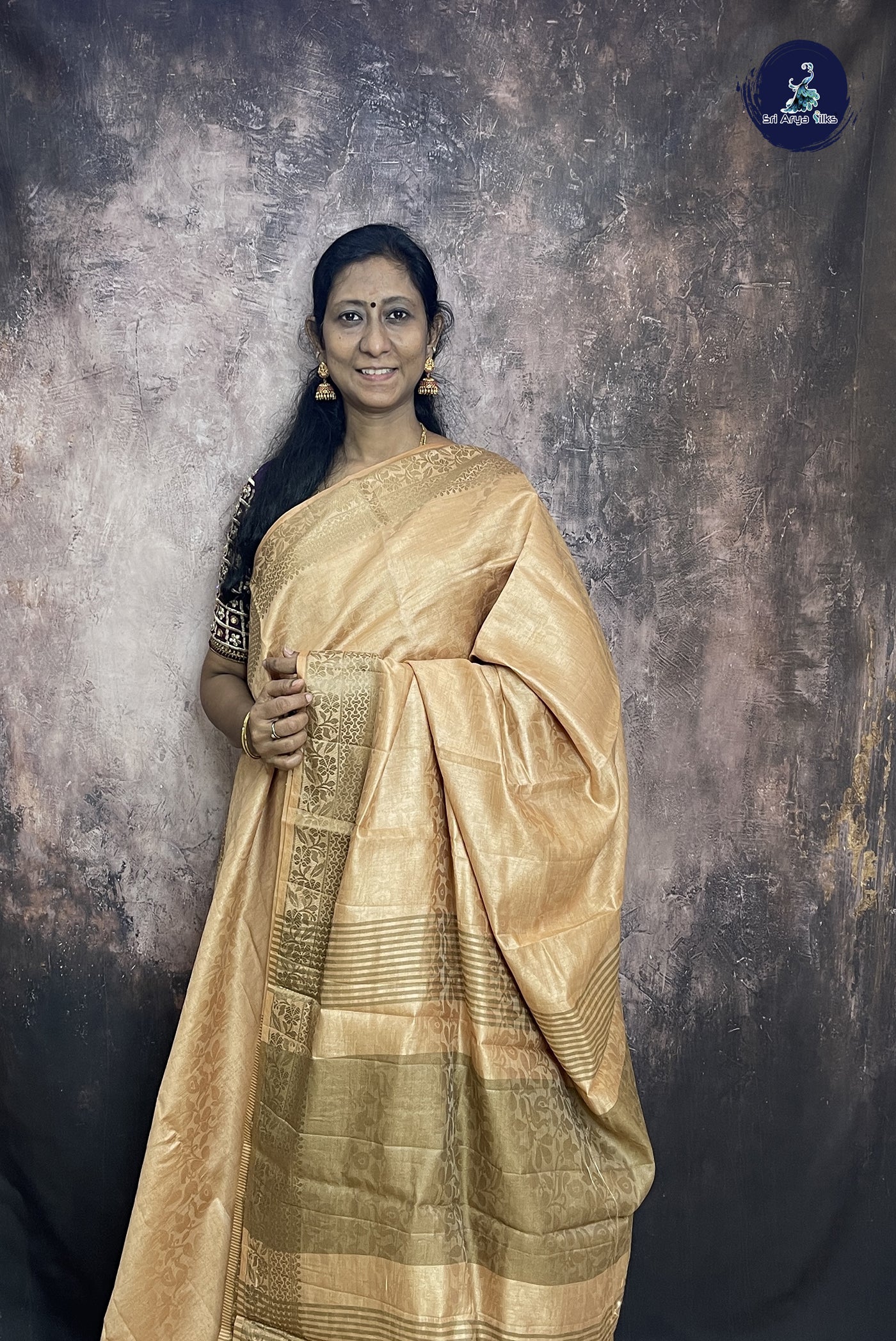 Cream Semi Tussar Saree With Embossed Pattern