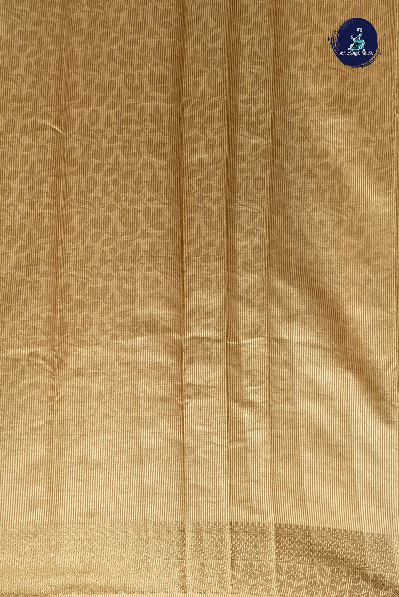 Cream Semi Tussar Saree With Embossed Pattern