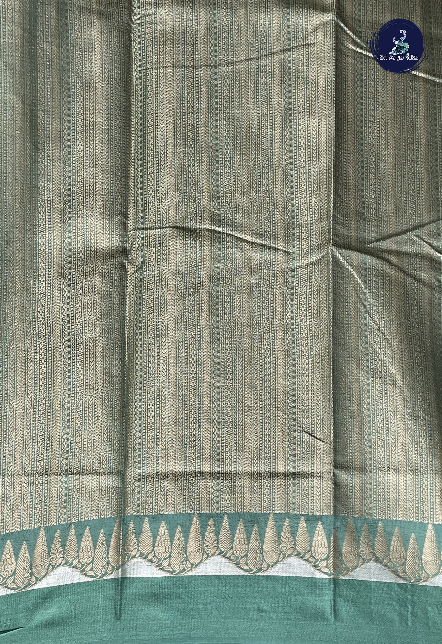 Emerald Green Semi Raw Silk Saree With Zari Buttas Pattern