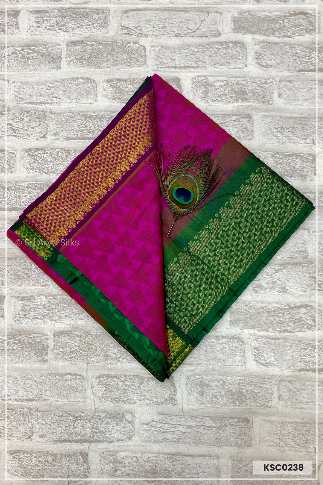Dark Pink & Green Embosed Saree With Green Blouse & Embosed Pattern