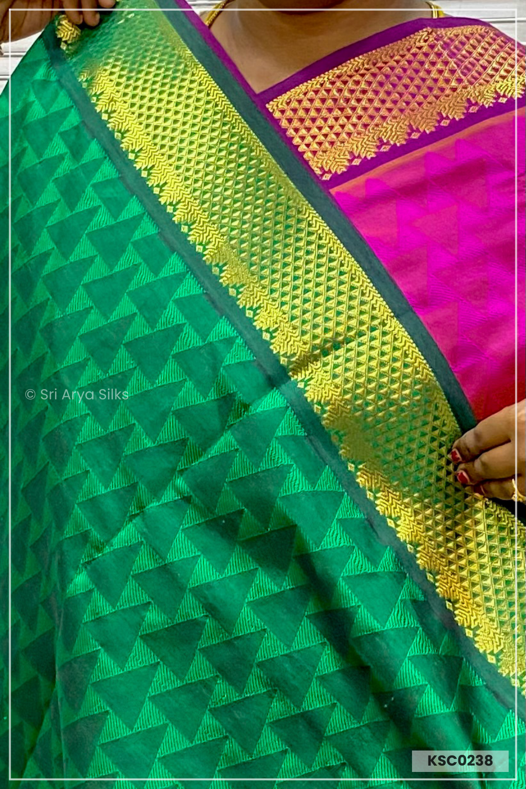 Dark Pink & Green Embosed Saree With Green Blouse & Embosed Pattern