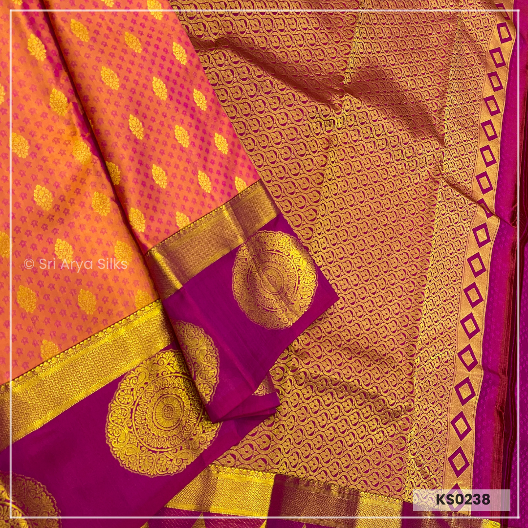 Dual Tone Orange Brocade Silk Saree With Magenta Pink Blouse & Embossed Pattern